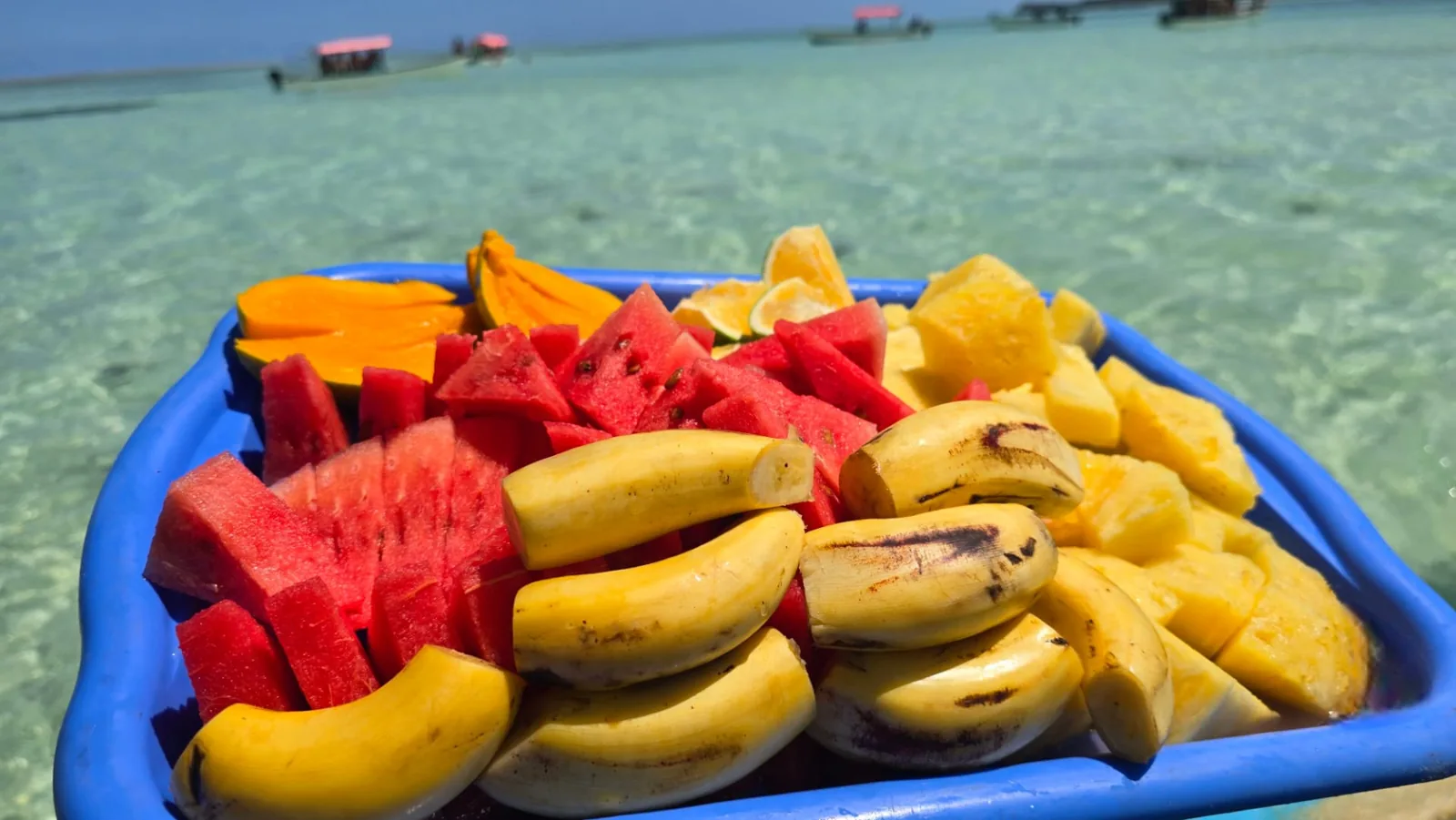 Fresh tropical fruit platter above the water at Blue Lagoon
