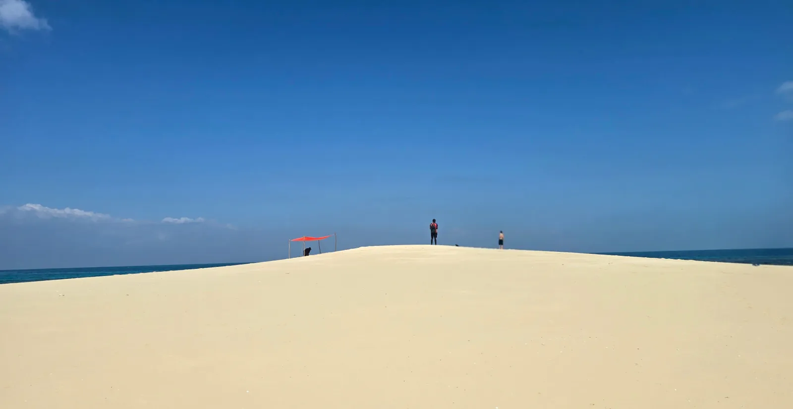 White sandbank under a deep blue sky in the Indian Ocean, Zanzibar